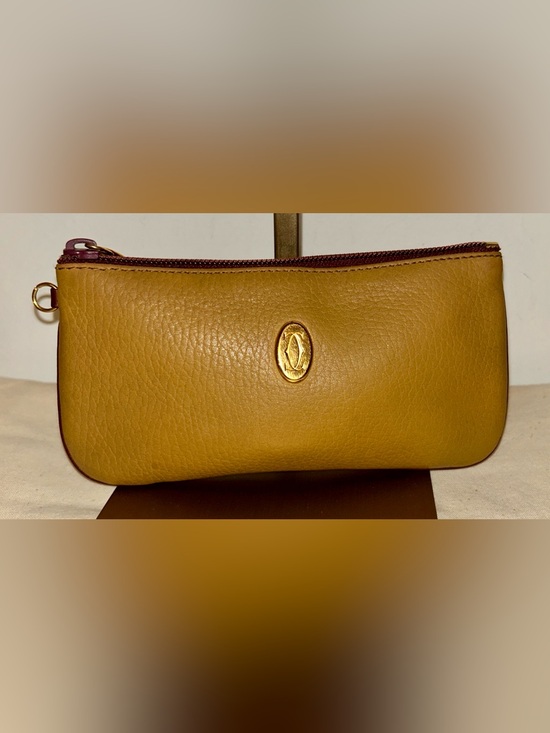 Cartier Handbags - vintage Must de Cartier leather pouch/wristlet in Mustard. Rare Colorway
